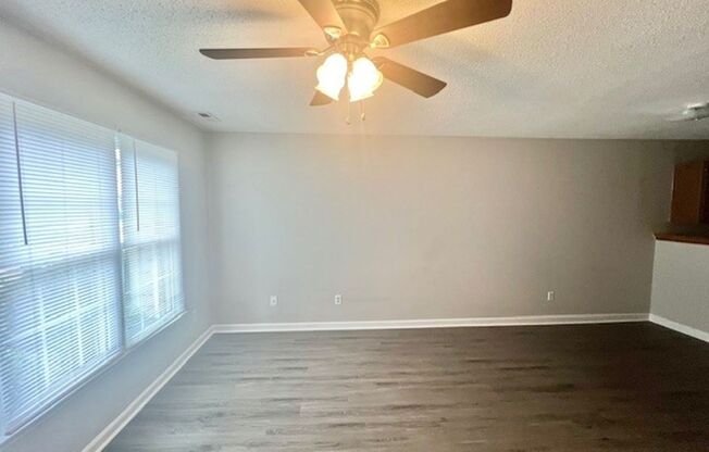 New Flooring!  New Paint!  Convenient to Schools & Shopping!  Lots of Closet Space!