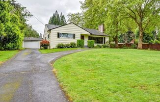 Gorgeous House with Extra Large Yard, Sports Court, and Oversized Garage!