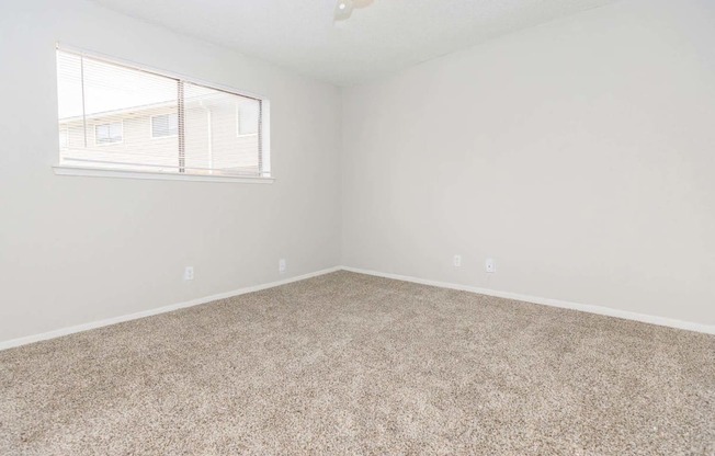 Carpeted Bedroom at Castlewood Apartments, Texas