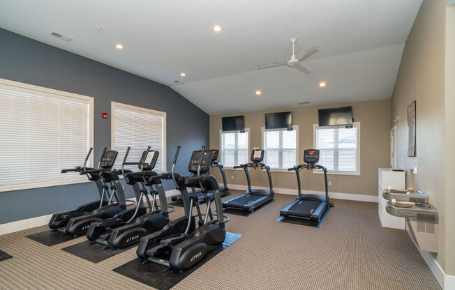 Cardio Machines In Gym at Strathmore Apartment Homes, Iowa