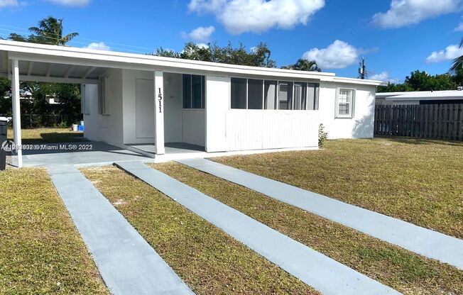 Updated 3-Bed/2-baths Home with Screened Porch & Lush Yard in Pompano Beach Highlands