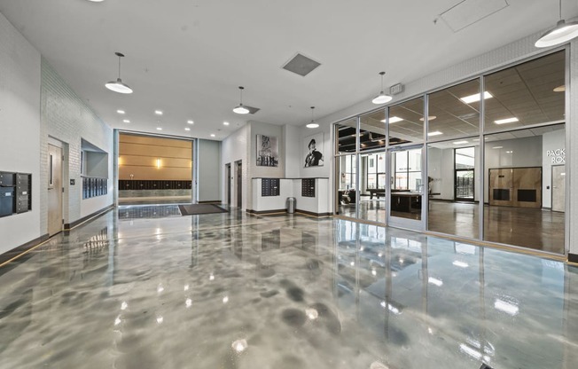 a large room with a shiny reflective floor  at The Icon, Virginia