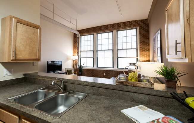 Sink With Faucet at Harness Factory Lofts and Apartments, Indianapolis, IN