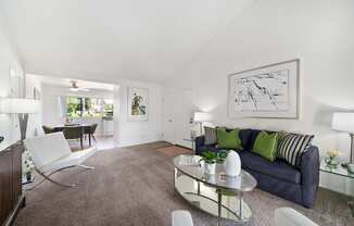 a living room with a couch and a coffee table