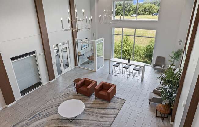 an open living room with a fireplace and a rug