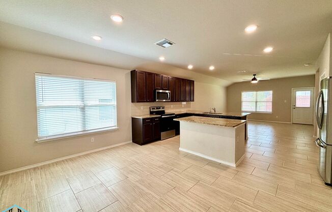 A Stunning Modern Home with Open Floor Plan and Abundant Natural Light!