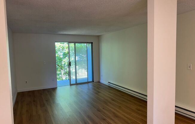 Charming Condo with Creek Views, Laminate Flooring, and Prime Location Near Washington Square!