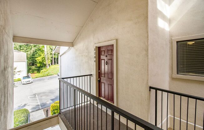 Sunlit 2BD/2BA with Fireplace in Peaceful Perimeter Community