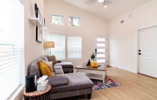 Spacious 3BR/3BA home in a quiet neighborhood near downtown and beaches, featuring private baths, outdoor seating areas, fenced yard, and modern comforts—perfect for short or long-term stays.