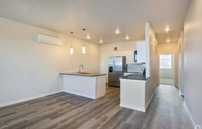 large open kitchen with granite counters at Palisade Park Townhomes, Broomfield Colorado