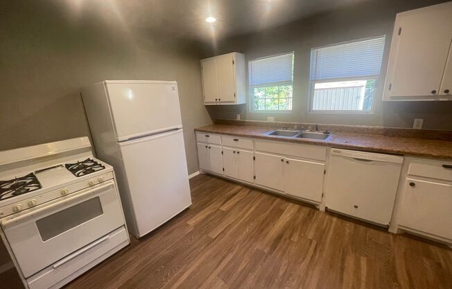 3 bed, 1 bath , beautiful wood floors, fenced backyard, laundry connections, fridge, gas range and storage shed! Cute, clean and ready for move in!