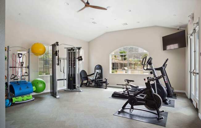 gym in the clubhouse at villas at houston levee west apartments in cordova, at Rancho Belago, Moreno Valley, CA, 92555
