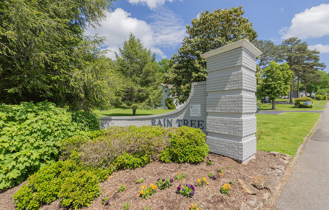 a park free sign on the side of a sidewalk