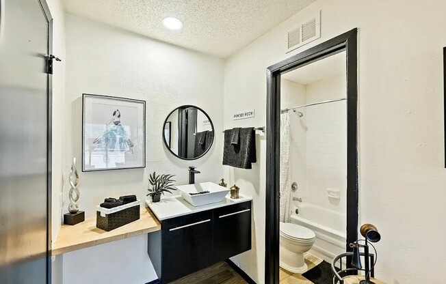 Experience modern living at The WerX. This stylish bathroom features contemporary fixtures, sleek finishes, and ample storage for your convenience. Elevate your lifestyle in a space designed for comfort and functionality. Schedule a tour today!