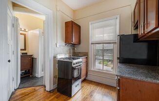 Attractive Remodeled Efficiency 2nd floor Studio, turn of the century building NO UTILITIES! - Ask about our no security deposit option!