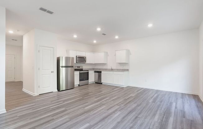 Newly Constructed 3/2.5 Townhome w/ Private Patio and Garage!