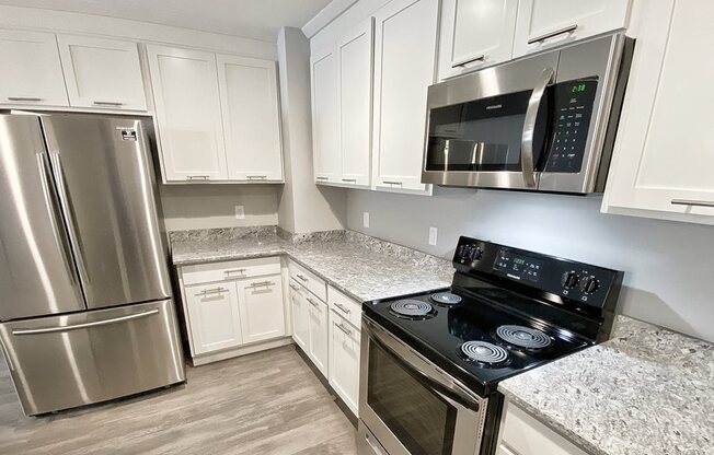 White Kitchen Cabinetry Remodel at Old Green Place Apartments, Integrity Realty LLC, Beachwood, 44122
