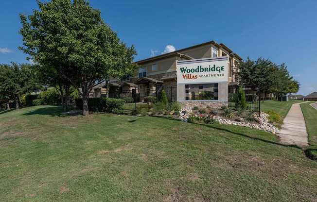 Large grassy area at Woodbridge Villas Apartments, Sachse, TX