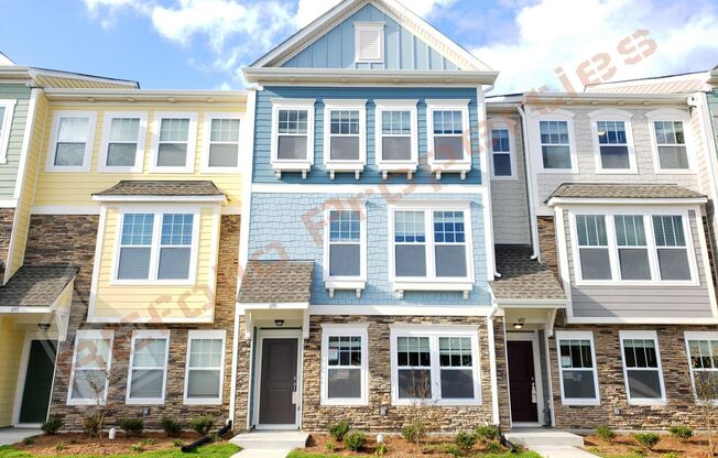 Beautiful Luxury 3 Story 3 Bedroom Townhome with 1st Floor Guest Suite, Attached 2 Car Garage, Community Pool and Fitness in Villages of Apex! Available Aug 7th!