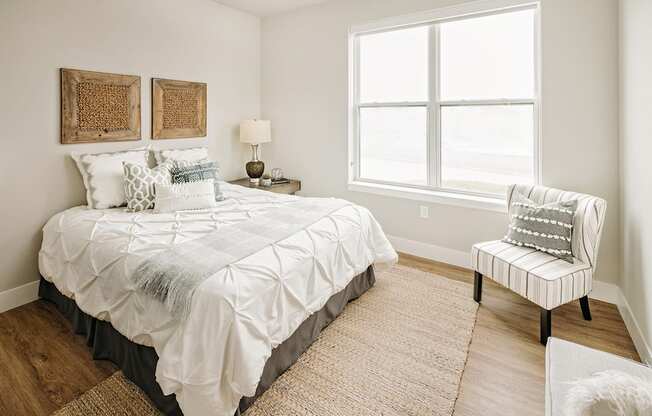 a bedroom with a bed and a window at 44 West Luxury Living, Valley Park, Missouri