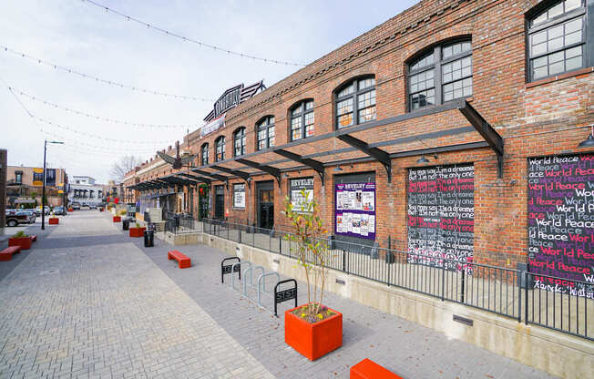 A brick building with a sign that says "World Peace" on it.
