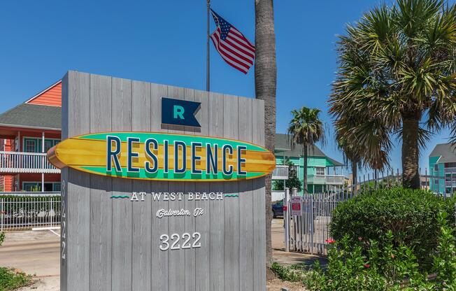 a sign in front of a building