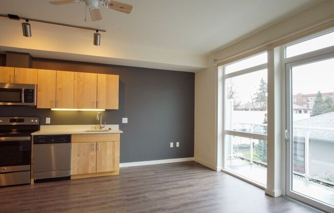 Slabtown: Rare 1 Bed + Den AND Balcony!