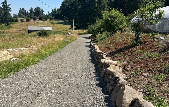 Beautifully Refreshed Home on Several Acres in Oregon city off Forsyth Road. 15 minutes from Highway 213 and 205.