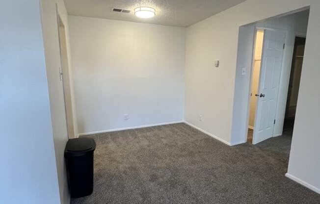 a skylight in the ceiling of a room with a white table and a