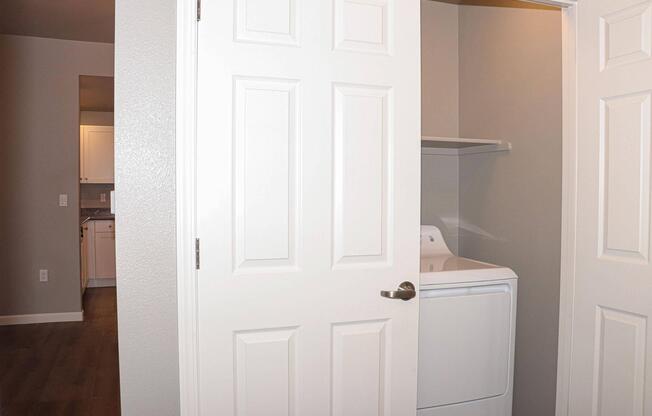 a kitchen with a sink and a refrigerator