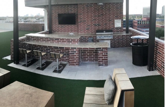 Grilling area on rooftop lounge at Tinsley on the Park | Luxury Apartments Houston