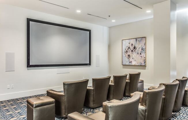 Media Room with 135” Quad-Screen Projector at Glass House by Windsor, Dallas, TX