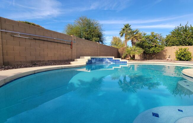 Gated community in Litchfield Park! SOLAR, Pool, and 3 car garage!