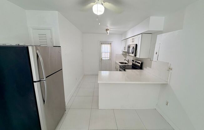 SPACIOUS UPGRADED TWO-BED ONE-BATH UNIT LOCATED IN THE HEART OF LITTLE HAVANA. THE BUILDING HAS A WASHER AND DRYER ON SITE