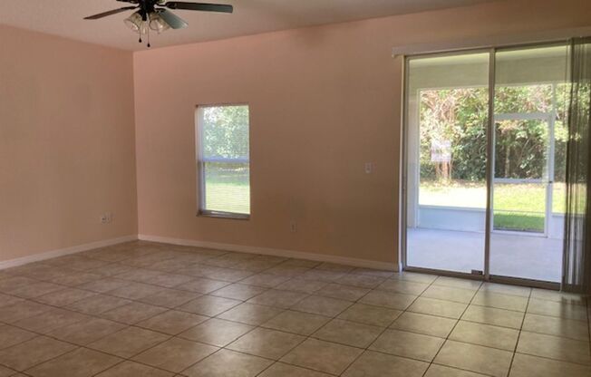 Spacious 4/2/2 Home with Screened-In Porch and Stylish Finishes