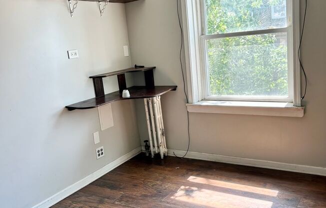 Condo with free heat! In-unit laundry, hardwoods, more!