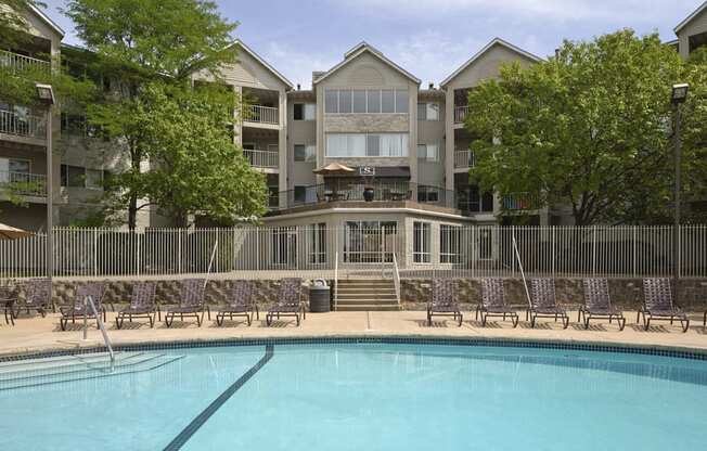 Outdoor pool with lounge chairs