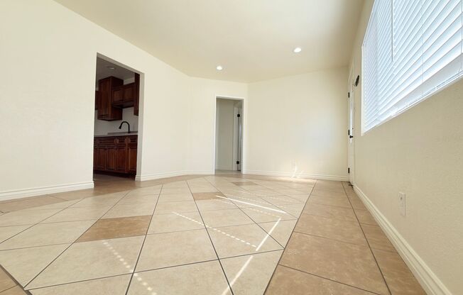 Spacious 4-Bedroom, 2-Bath Gated Home with Garage & Private Backyard