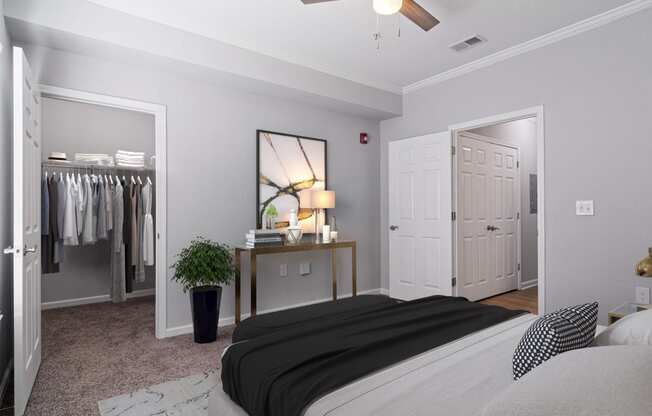 The Asher at Sugarloaf apartments in Lawrenceville Georgia photo of bedroom with ceiling fan