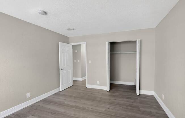 A room with a door and a window.