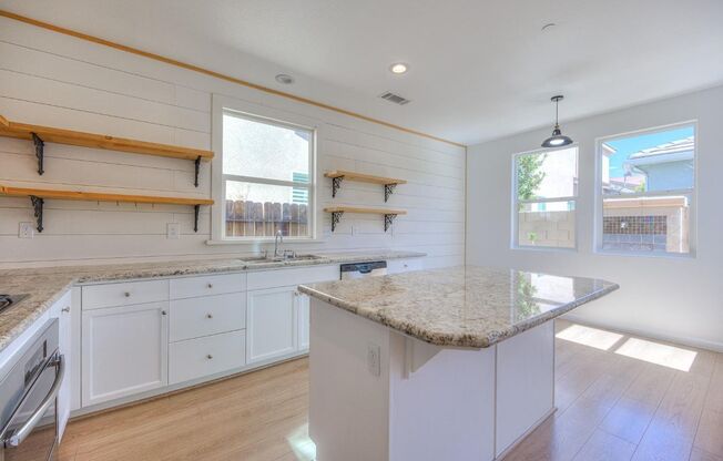 Spacious 3-Bedroom Home with a Backyard in Harlan Ranch Community!