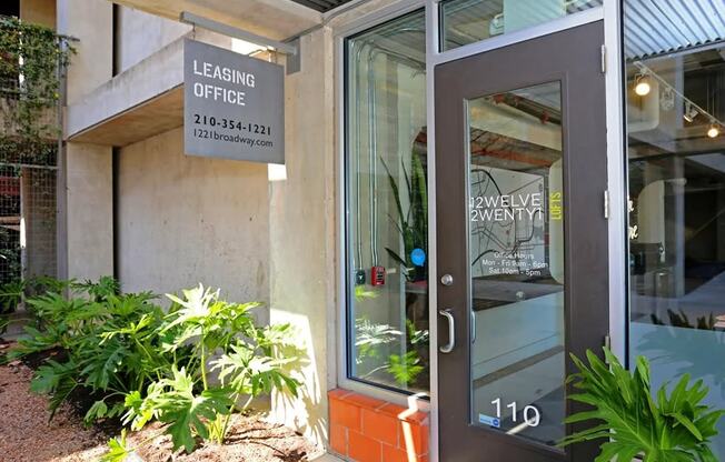 the front entrance of leasing office with the door open