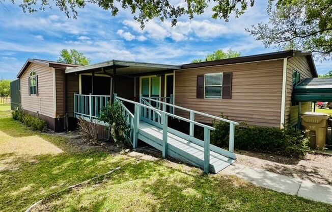 3/2 with POOL, newly renovated, AND on 2.5 acres in Groveland! Available NOW!