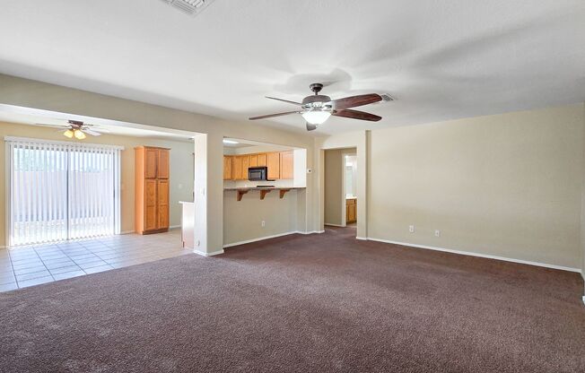 Three bedrooms plus a den at an affordable price! New carpet!