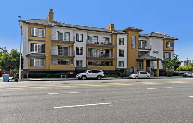 A large apartment building with the number 540 on it.