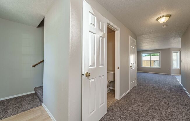 Your Next Home Awaits! 4BR/2.5BA with Fenced Yard & Garage