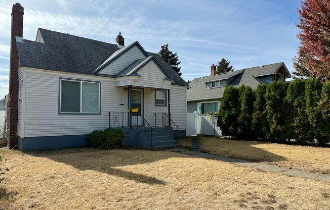 Ideally Located 2 Bed 1 Bath Spokane Home w/ Large Fenced Yard & Detached Garage!