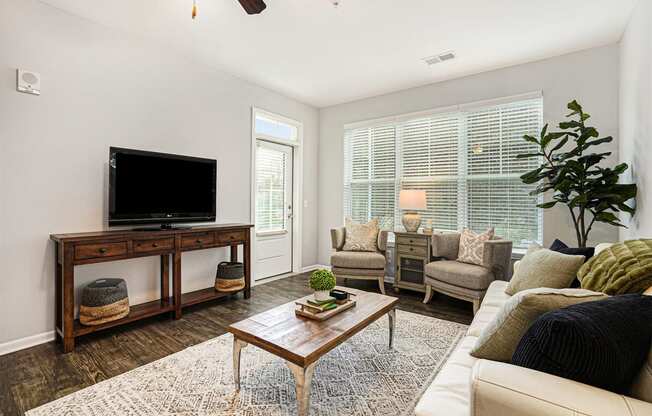 a living room with a couch and a tv