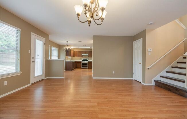 No Carpet! Tons of Space! Beautiful backyard with large covered patio!