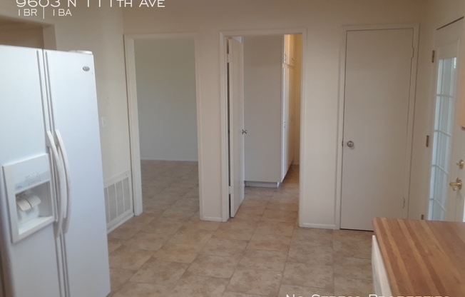 9603 N 111 AVE